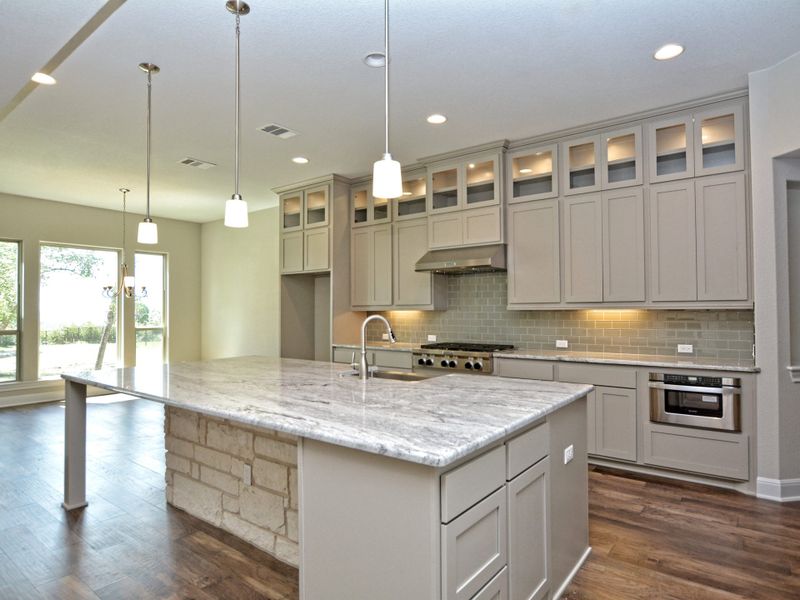 Representative furnished interior of a home built from the Santa Barbara II by Giddens Homes in Scofield Farms Estates, Georgetown (Image 5).