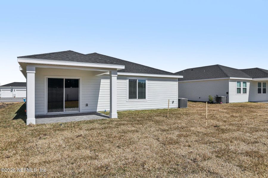 Exterior details and patio area of a home in Colbert Landings, Palm Coast (Image 24).