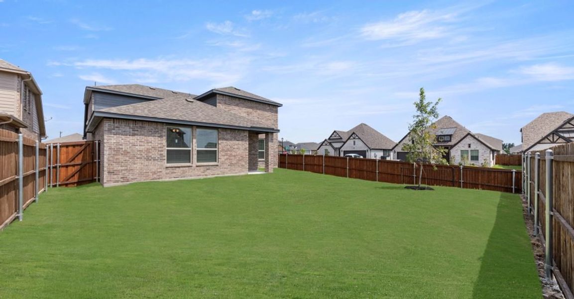 Representative exterior photo of a completed home built from the Raleigh by Impression Homes in Baker Farms, Cleburne, TX (Image 24).