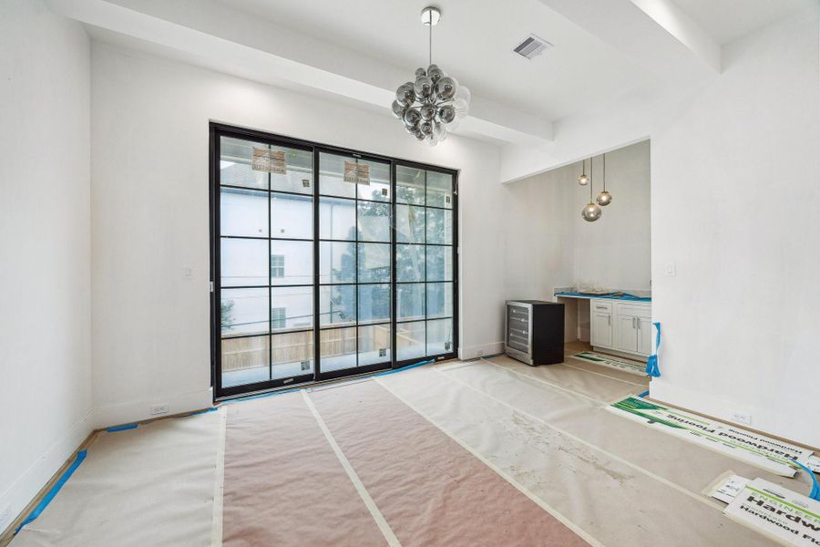 The current stage of construction as of January 20th, 2026.  Estimated Completion February/March 2026.  This home is almost done!.  There is a Cigar Terrace looking out over the back yard.