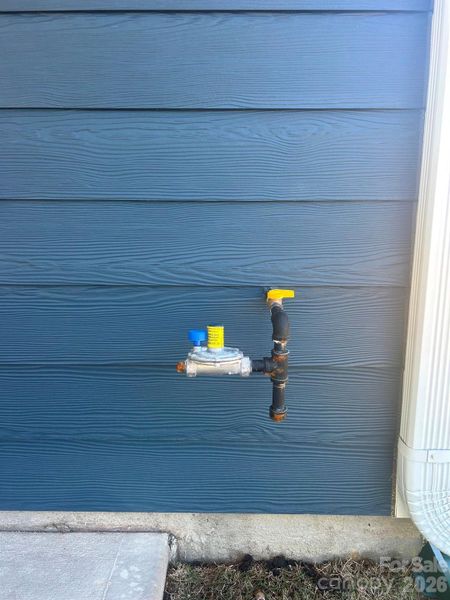 Gas stub at rear of home. Gas stub at rear of home.