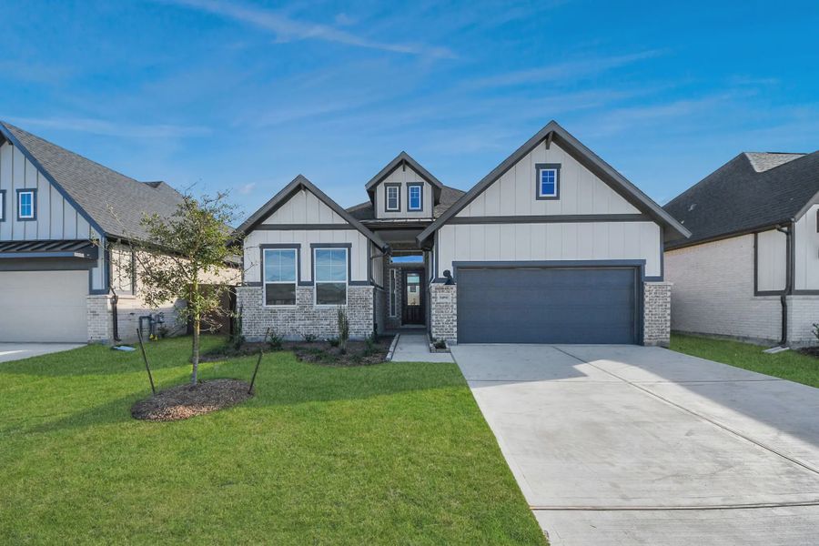 Representative exterior photo of a completed home built from the Summerton by Chesmar Homes in Meridiana 50's and 60's, Manvel, TX (Image 25).