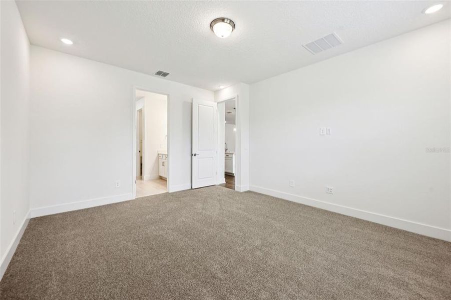 Spacious, unfurnished interior of a new home in Ridgehaven - Signature Series, Ormond Beach (Image 36).