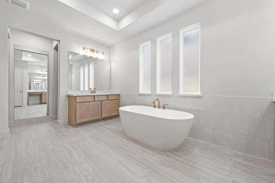 Furnished interior view inside a new home in Bridgeland, Cypress (Image 7).