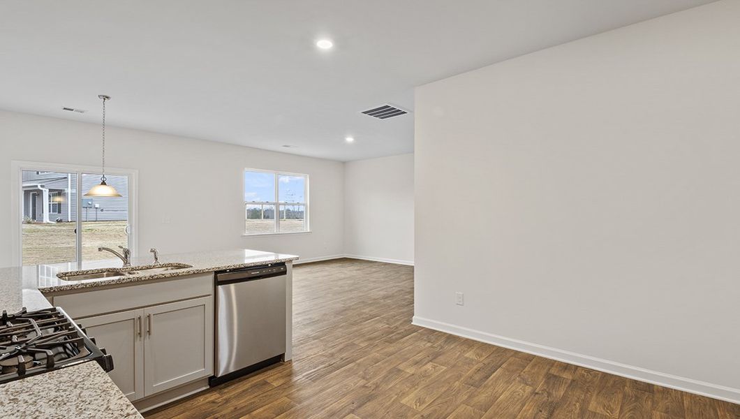 Representative furnished interior of a home built from the Macon by D.R. Horton in Lakestone, Woodruff (Image 7).