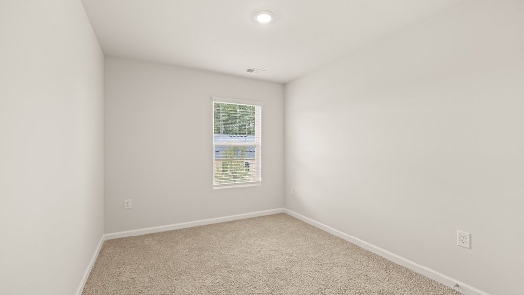 Spacious, unfurnished interior of a new home in Young's Crossing, Stone Mountain (Image 13).