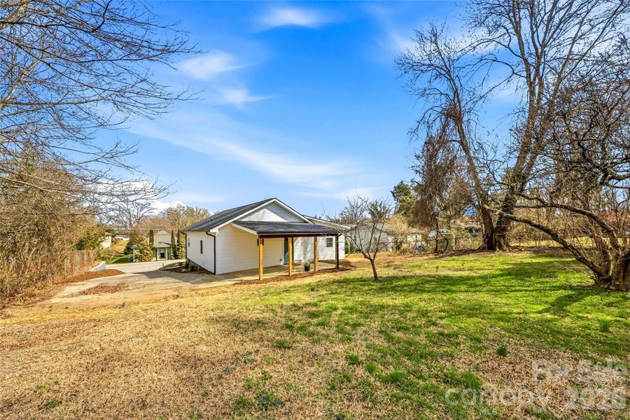 Exterior details and patio area of a home in , Hendersonville (Image 23).