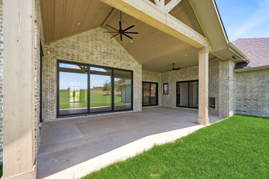Exterior details and patio area of a home in Fleming Pointe, Fort Worth (Image 4).