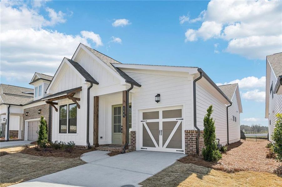 Front exterior of a new home in Aberdeen, Hoschton, GA, highlighting curb appeal (Image 27).
