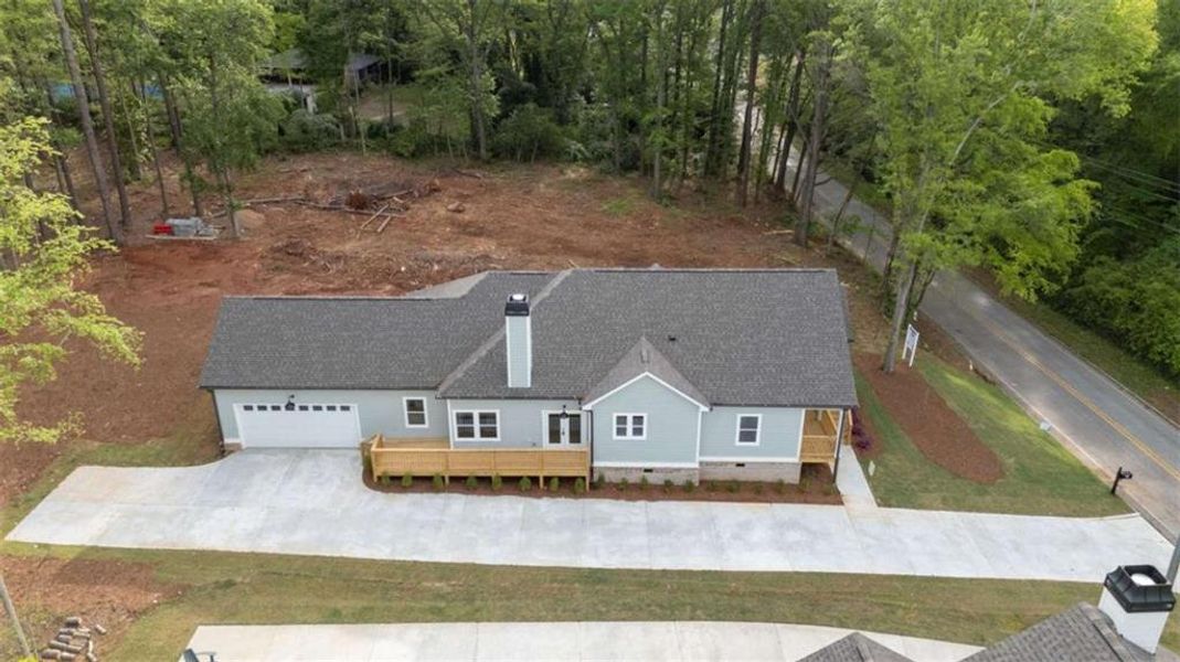 Front exterior of a new home in , Covington, GA, highlighting curb appeal (Image 2). Front exterior of a new home in , Covington, GA, highlighting curb appeal (Image 2).