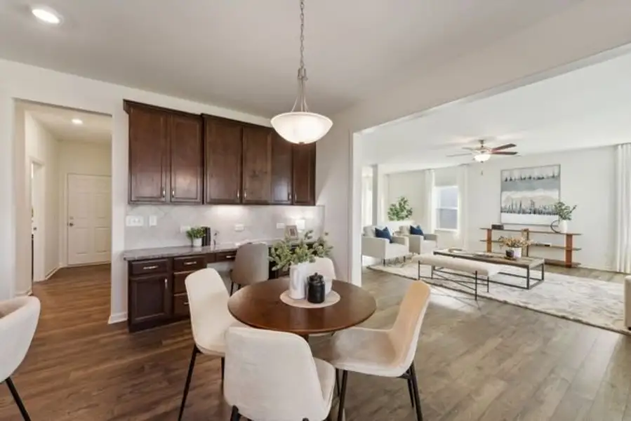 Representative furnished interior of a home built from the Winslow by True Homes in Whispering Hills, Locust (Image 8).