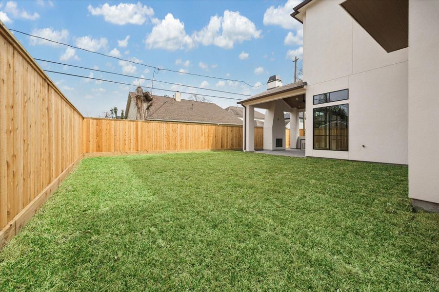 Generous backyard lawn offers expansive green space ideal for play, pets, or future pool plans. Fully fenced with room to add landscaping, lounge areas, or outdoor features, the yard complements the covered patio and creates endless possibilities for outdoor living.