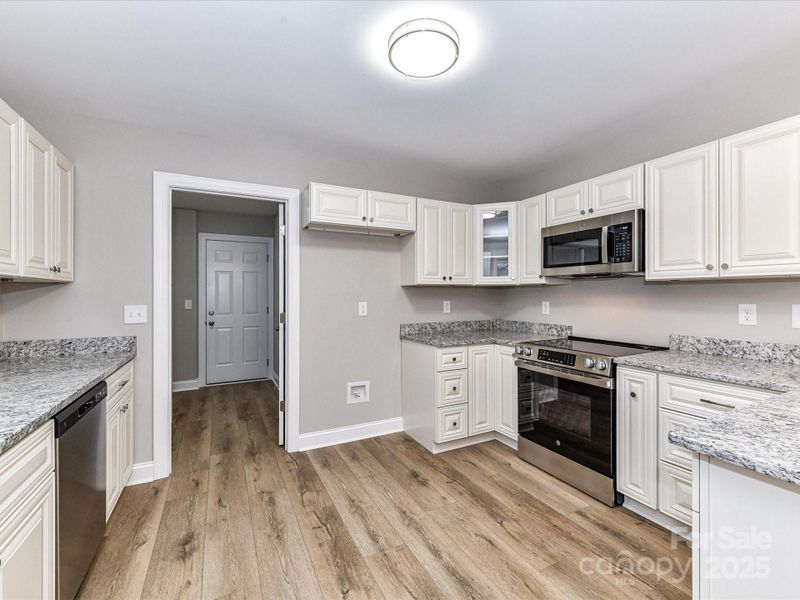 Furnished interior view inside a new home in , Oakboro (Image 8).