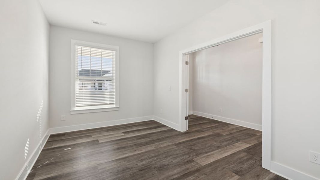 Representative unfurnished interior of a home built from the Phoenix by D.R. Horton in Edgewood Estates, Greenville (Image 9).