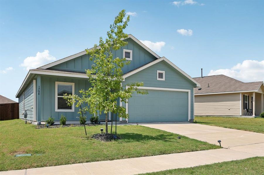 Front exterior of a new home in , Crandall, TX, highlighting curb appeal (Image 2).
