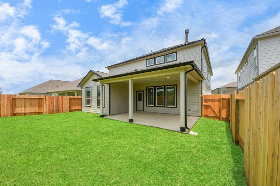 Backyard retreat, offering an abundance of space for kids to play and explore. The possibilities are endless in this outdoor haven, where the joy of open-air activities and family gatherings awaits. Sample photo of completed home with similar floor plan. Actual colors and selections may vary. Backyard retreat, offering an abundance of space for kids to play and explore. The possibilities are endless in this outdoor haven, where the joy of open-air activities and family gatherings awaits. Sample photo of completed home with similar floor plan. Actual colors and selections may vary.