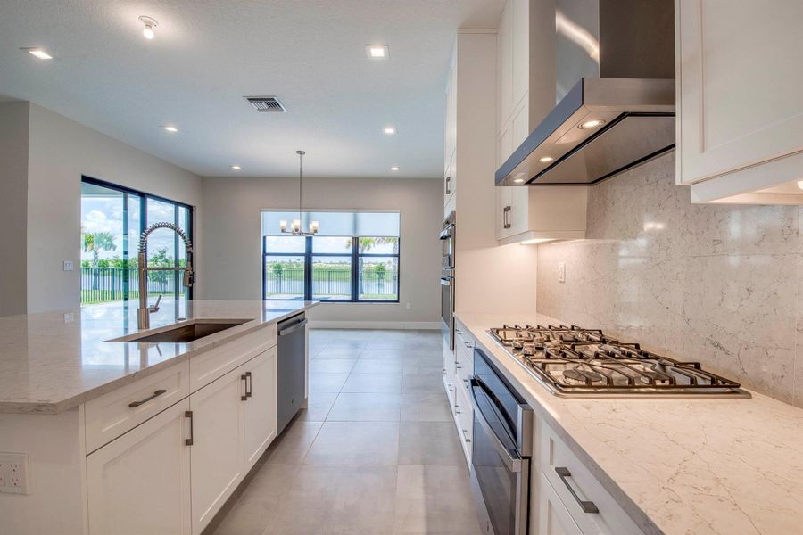 Furnished interior view inside a new home in Apex at Avenir, Palm Beach Gardens (Image 8). Furnished interior view inside a new home in Apex at Avenir, Palm Beach Gardens (Image 8).