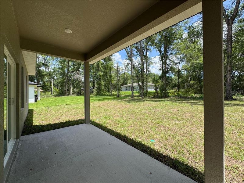 Exterior details and patio area of a home in , Citrus Springs (Image 19).