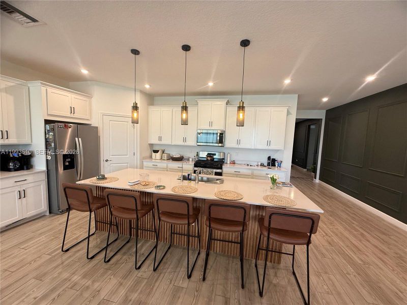 Furnished interior view inside a new home in Tradition, Port St. Lucie (Image 5).