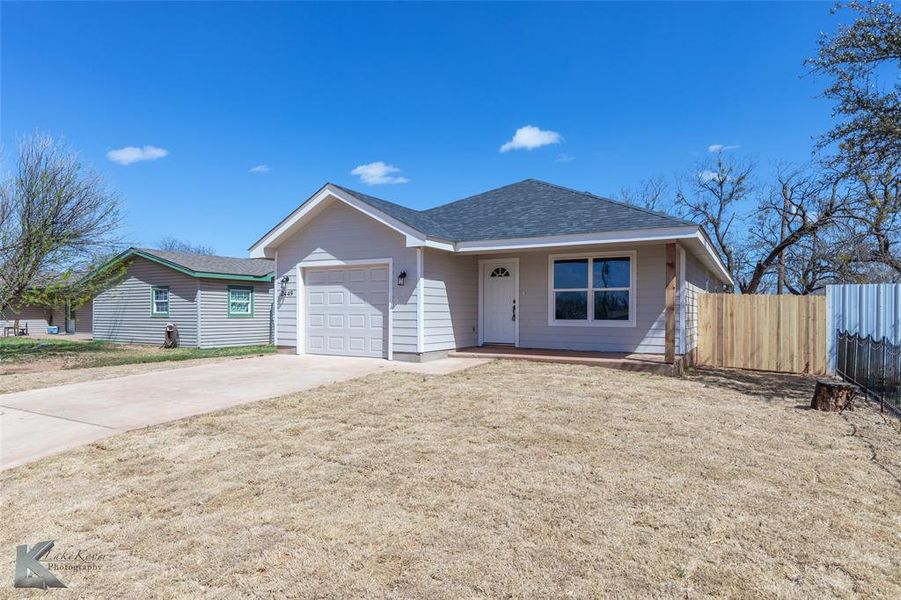 Front exterior of a new home in , Abilene, TX, highlighting curb appeal (Image 16). Front exterior of a new home in , Abilene, TX, highlighting curb appeal (Image 16).