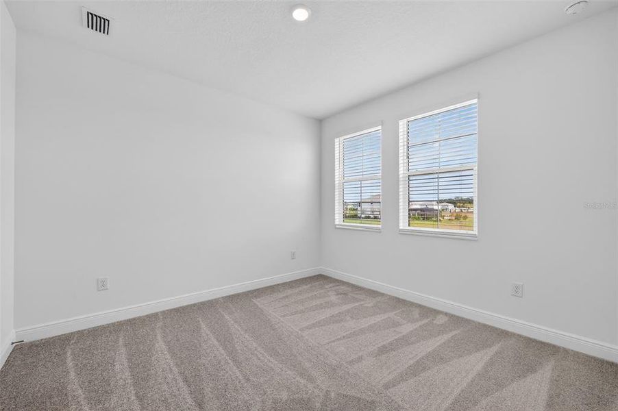 Spacious, unfurnished interior of a new home in Hawkstone, Sarasota (Image 43).