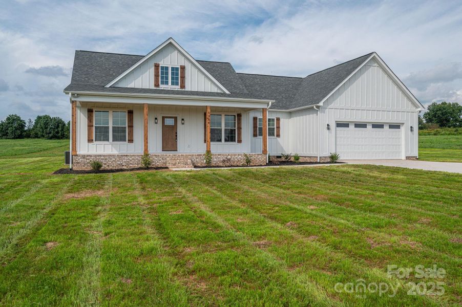 Front exterior of a new home in , Vale, NC, highlighting curb appeal (Image 32).