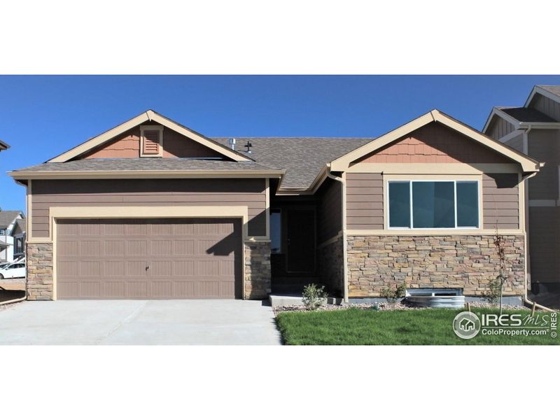 Front exterior of a new home in , Johnstown, CO, highlighting curb appeal (Image 2).