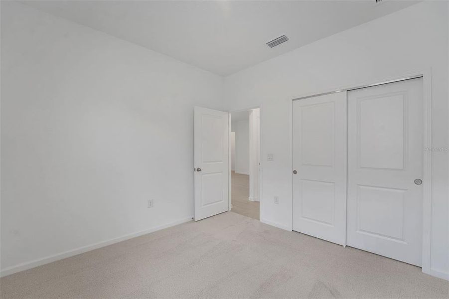 Spacious, unfurnished interior of a new home in Cypress Park Estates, Haines City (Image 16). Spacious, unfurnished interior of a new home in Cypress Park Estates, Haines City (Image 16).