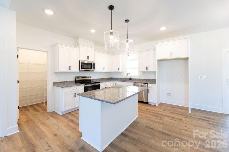 Furnished interior view inside a new home in , Clover (Image 13).