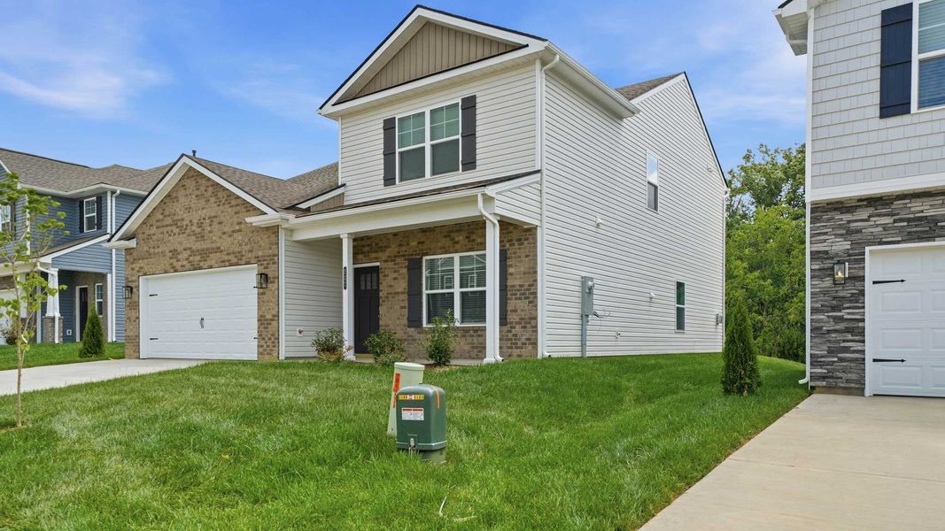 Front exterior of a new home in Fieldcrest Acres, Blountville, TN, highlighting curb appeal (Image 17). Front exterior of a new home in Fieldcrest Acres, Blountville, TN, highlighting curb appeal (Image 17).