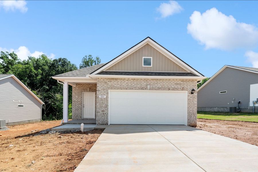 Front exterior of a new home in Jackson Hills, Clarksville, TN, highlighting curb appeal (Image 1). Front exterior of a new home in Jackson Hills, Clarksville, TN, highlighting curb appeal (Image 1).