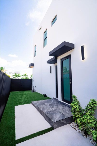 Exterior details and patio area of a home in , Miami (Image 41). Exterior details and patio area of a home in , Miami (Image 41).