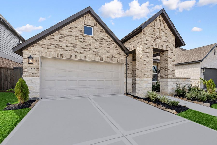 Front exterior of a new home in Riceland - Enclave Collection, Mont Belvieu, TX, highlighting curb appeal (Image 2). Front exterior of a new home in Riceland - Enclave Collection, Mont Belvieu, TX, highlighting curb appeal (Image 2).
