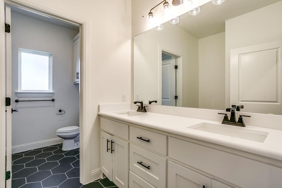 Representative furnished interior of a home built from the Cypress Court House by Trinity Classic Homes in Freeman Ranch, Weatherford (Image 10).