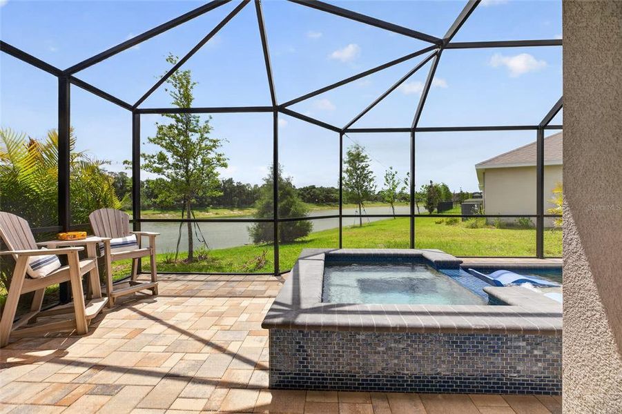 Exterior details and patio area of a home in Seaire, Parrish (Image 34).