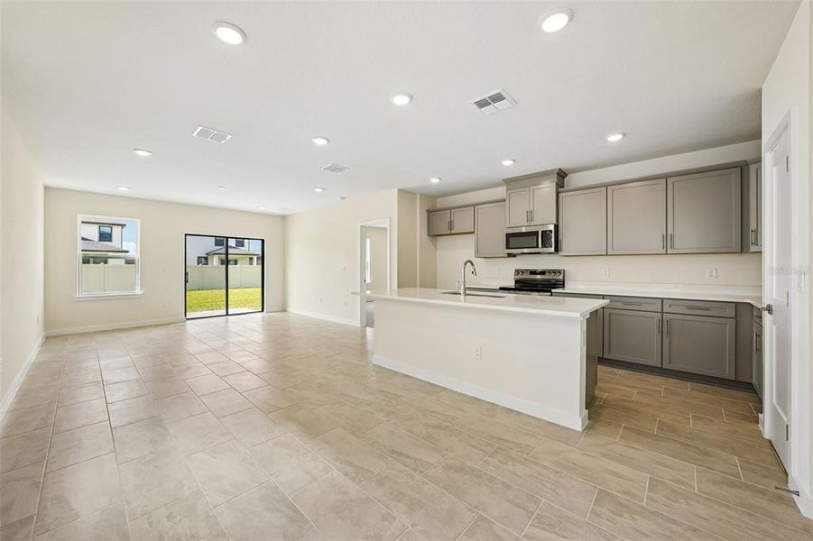 Furnished interior view inside a new home in Grasslands West, Lakeland (Image 17).