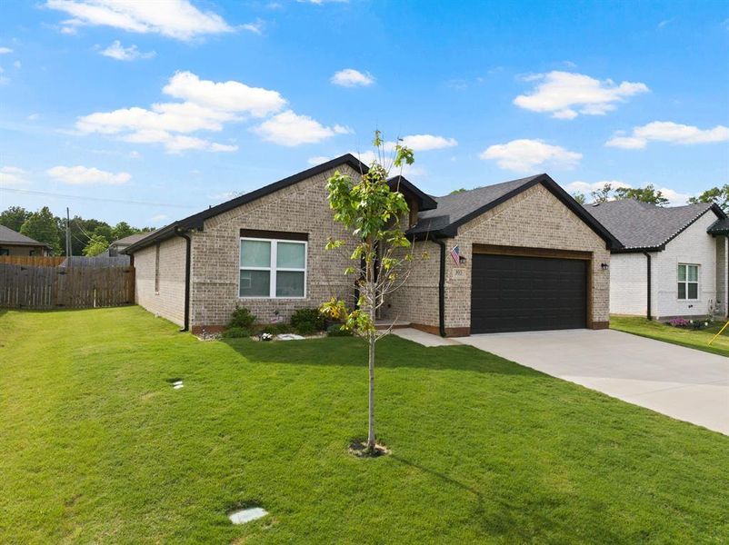 Front exterior of a new home in , Mount Pleasant, TX, highlighting curb appeal (Image 25).