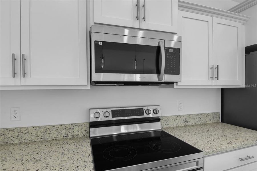 Furnished interior view inside a new home in , Kissimmee (Image 7).