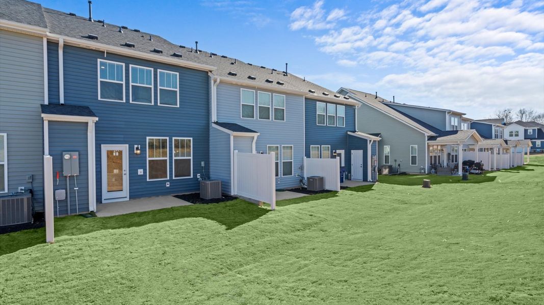 Superior curb appeal continues to the back with a refined, backyard space at Silo Ridge in Anderson, SC