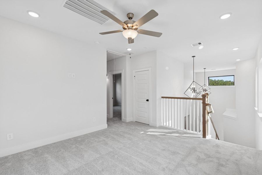 Spacious, unfurnished interior of a new home in The Highlands 40', Porter (Image 24).