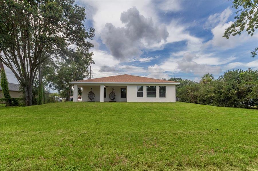 Front exterior of a new home in , Spring Hill, FL, highlighting curb appeal (Image 27).
