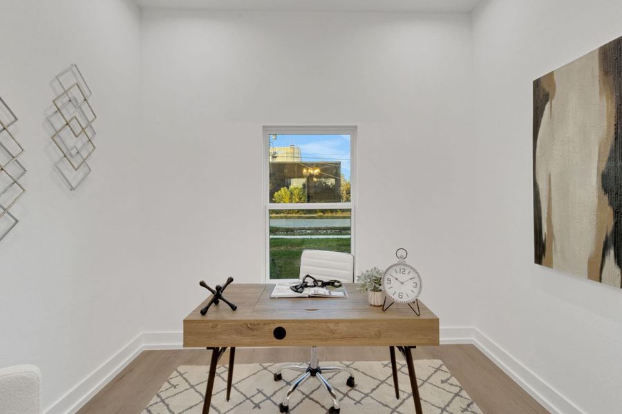 Dedicated office space with serene views and plenty of natural light. Dedicated office space with serene views and plenty of natural light.