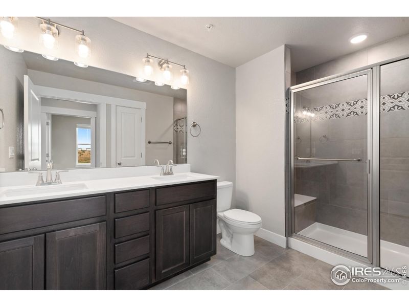 Gorgeous primary bathroom w/ double vanity.