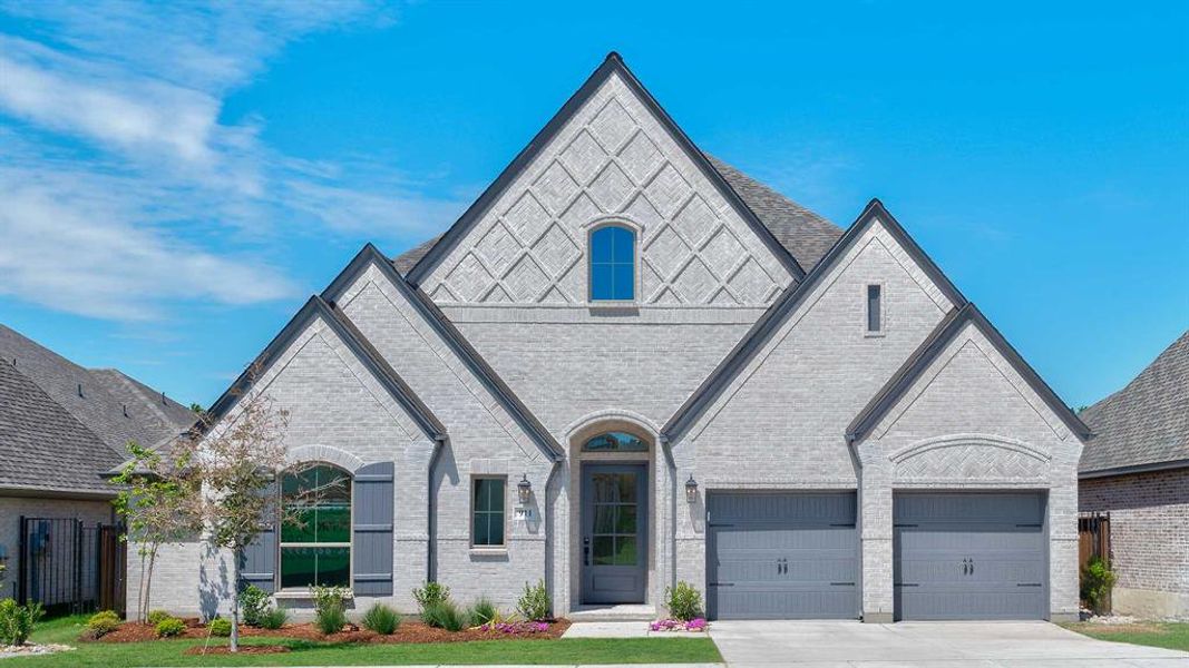 Front exterior of a new home in Hillstead, Lavon, TX, highlighting curb appeal (Image 1). Front exterior of a new home in Hillstead, Lavon, TX, highlighting curb appeal (Image 1).