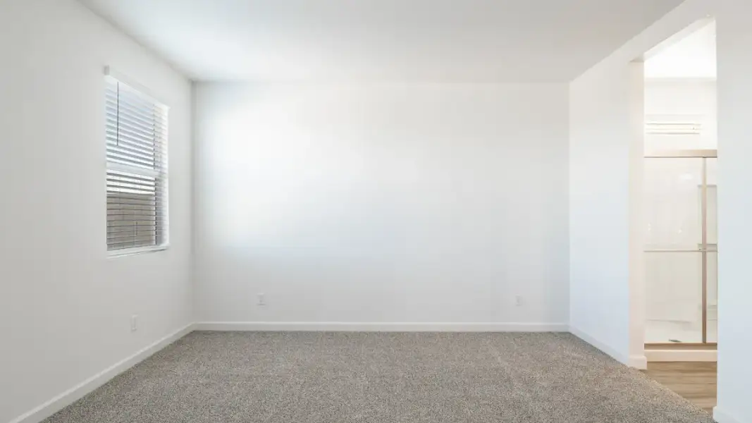 Spacious, unfurnished interior of a new home in Zanjero Pass, Waddell (Image 26).