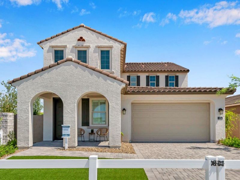 Front exterior of a new home in Icon at Thunderbird, Glendale, AZ, highlighting curb appeal (Image 1). Front exterior of a new home in Icon at Thunderbird, Glendale, AZ, highlighting curb appeal (Image 1).