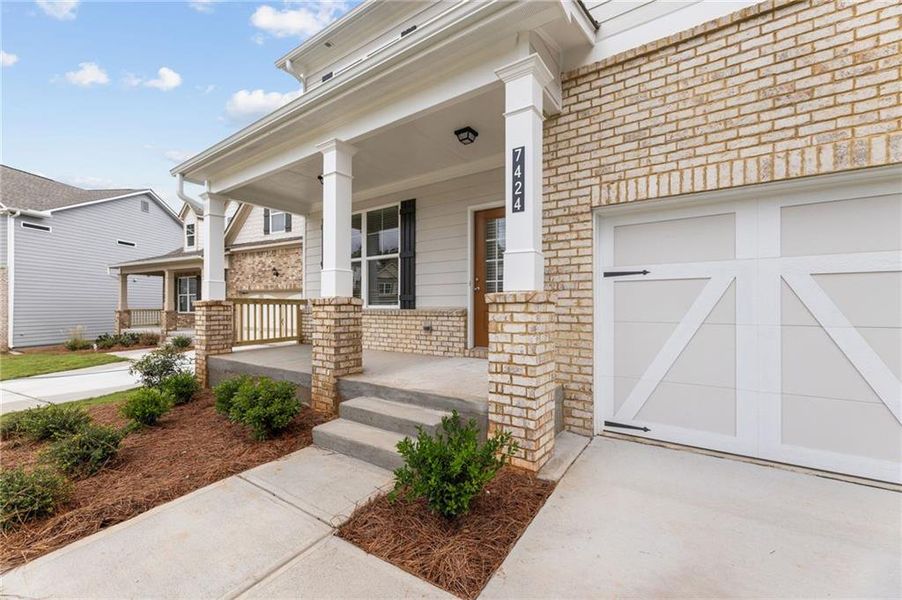 Exterior details and patio area of a home in Clark Farms, Flowery Branch (Image 21).