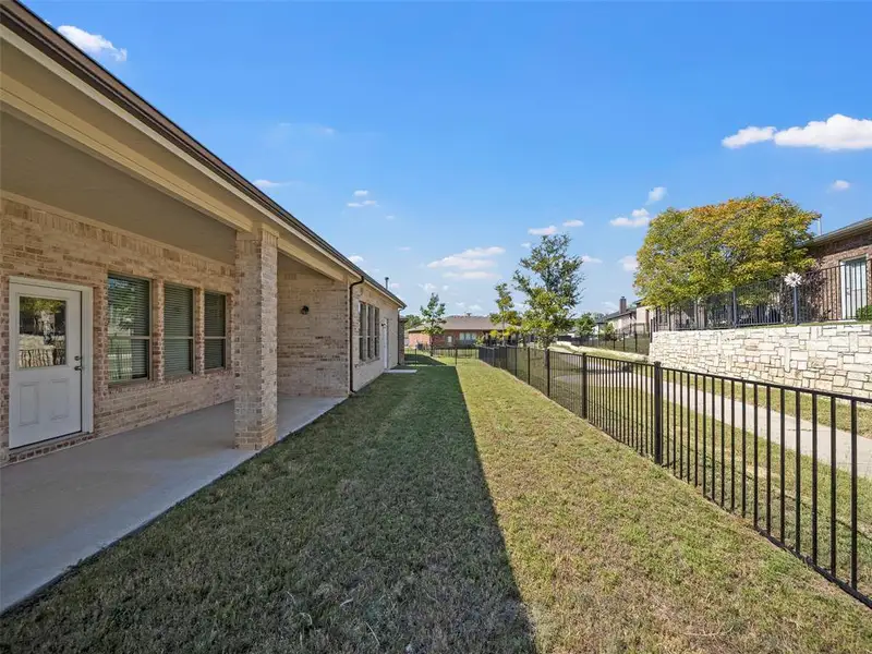 Exterior details and patio area of a home in , McKinney (Image 4).
