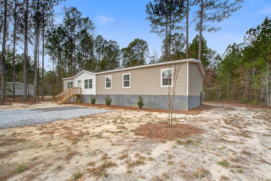 Exterior details and patio area of a home in , Walterboro (Image 23).