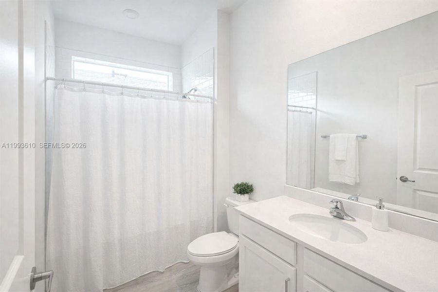 Furnished interior view inside a new home in Tradition, Port St. Lucie (Image 12).